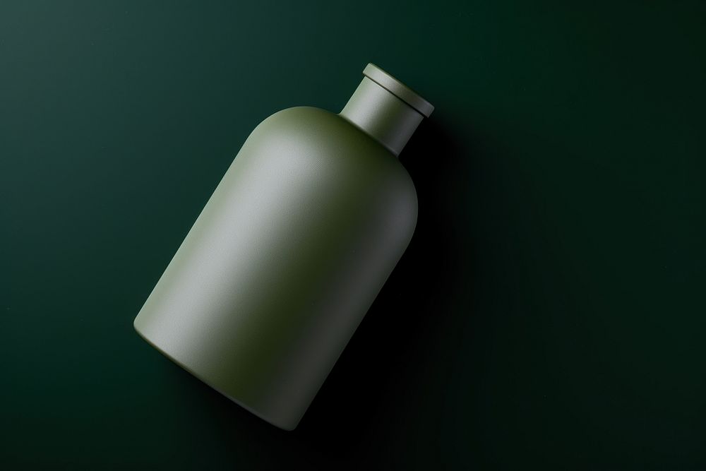 Ceremic bottle in army green refreshment still life container.