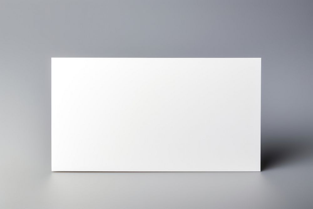 A white card paper white background simplicity.