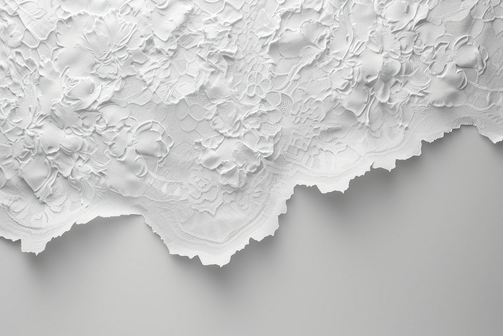 Bas-relief lace sculpture texture white backgrounds monochrome.