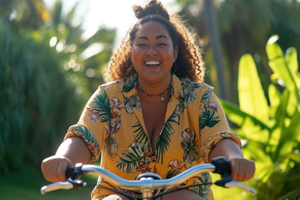 Samoan woman outdoors bicycle riding.