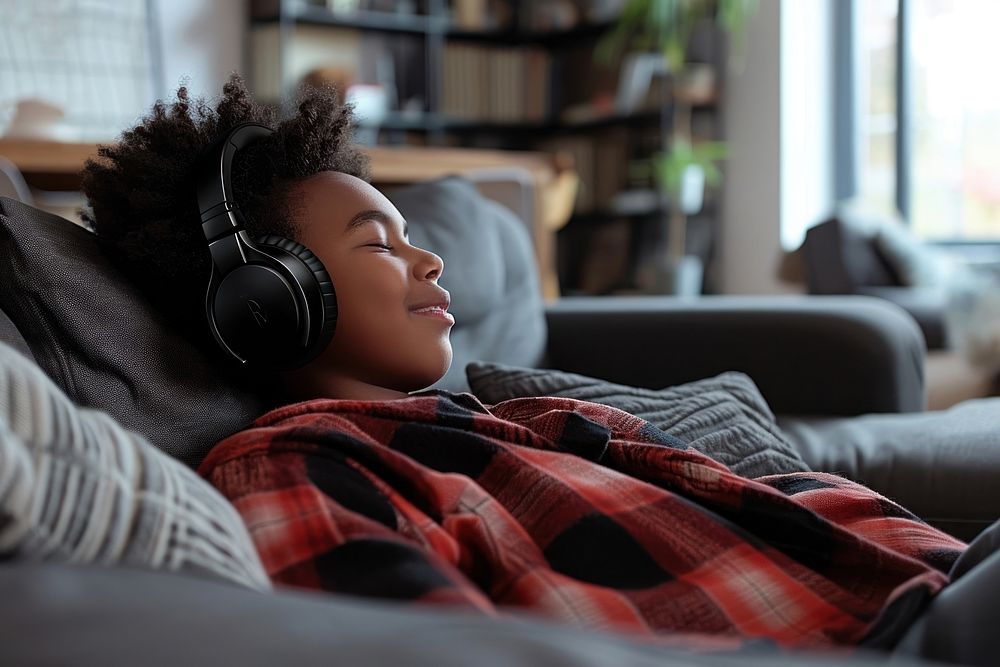Mixed race boy headphones headset comfortable.