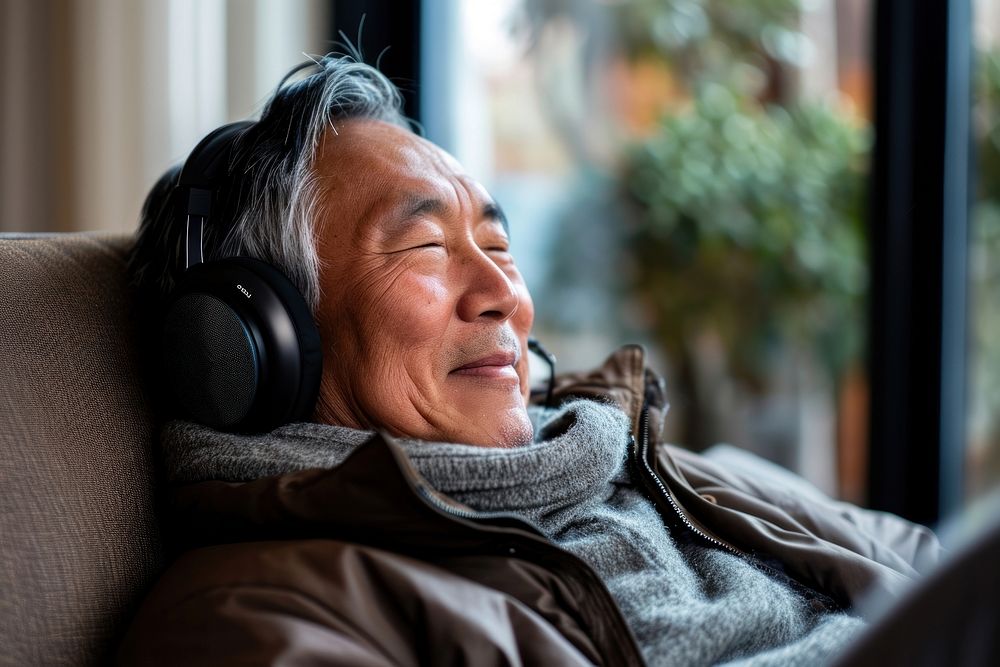 Senior asian man headphones adult electronics.