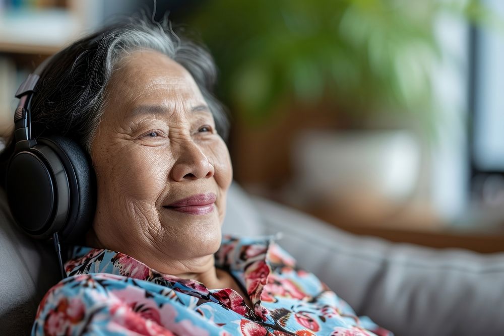 Senior philipino woman headphones headset adult.