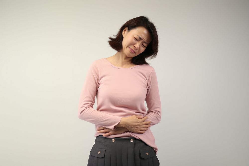 Mature woman with stomach pain photography portrait sleeve. AI generated Image by rawpixel.