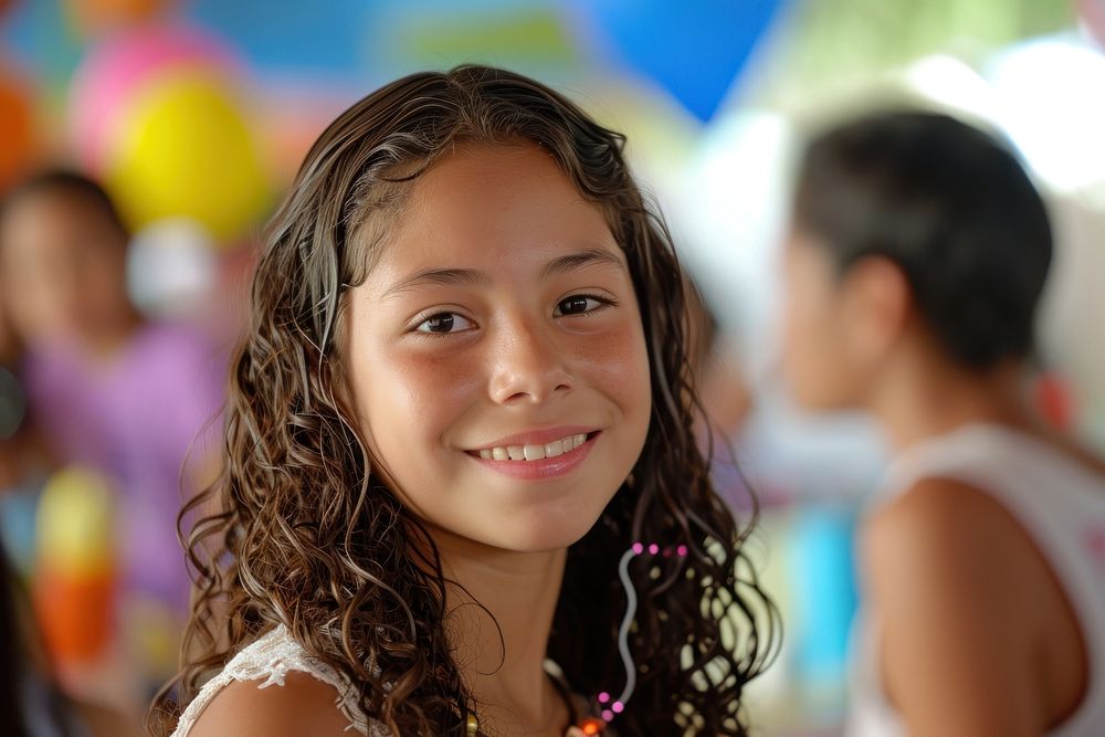Hispanic teenager girl portrait child smile.