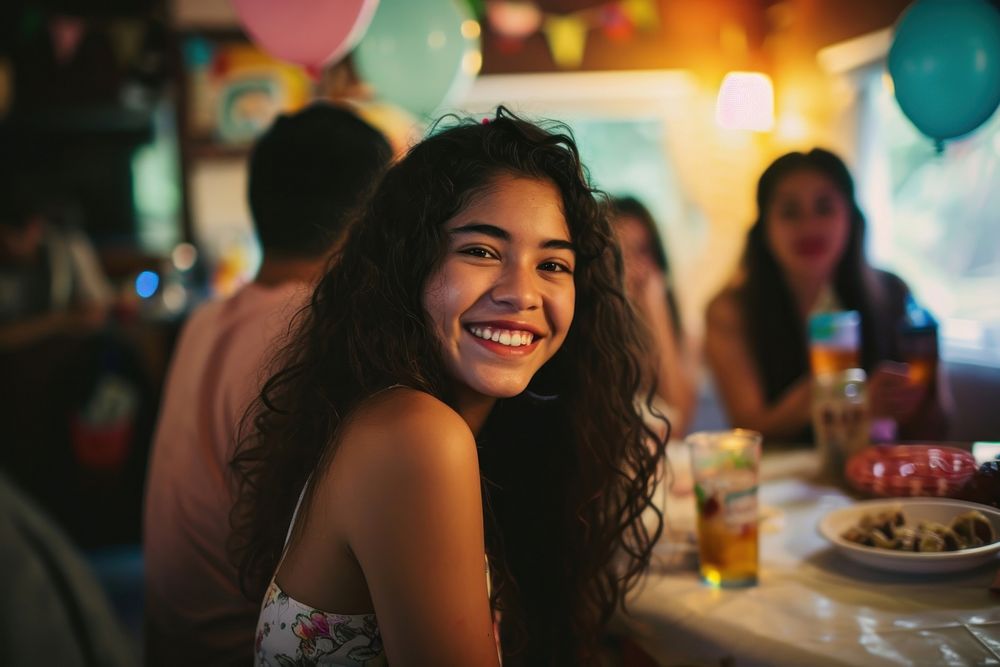 Hispanic teenager girl party laughing portrait.