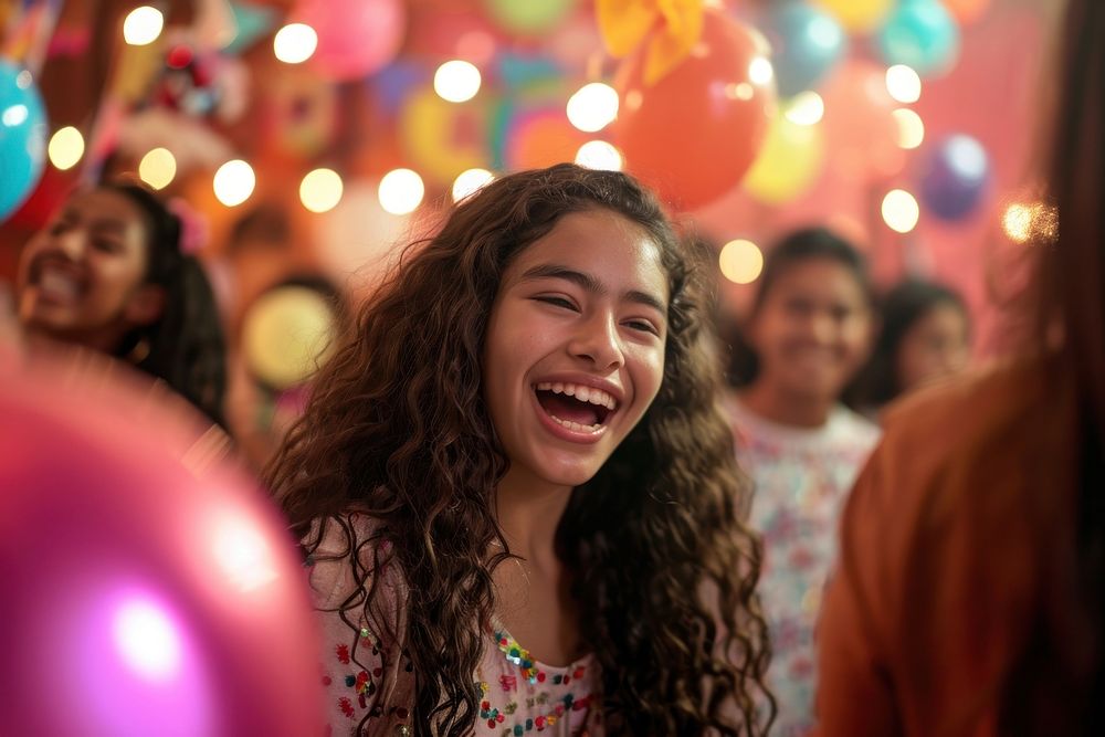 Hispanic teenager girl birthday laughing balloon.