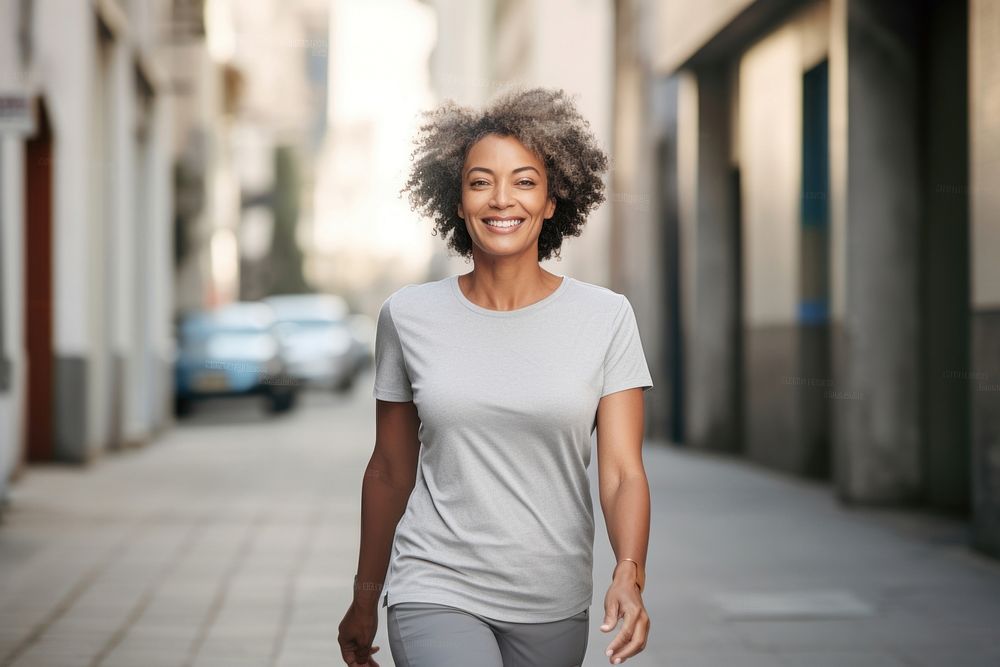 Lifestyle Black woman outdoors walking.
