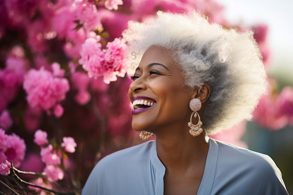 Lifestyle Black woman laughing outdoors.