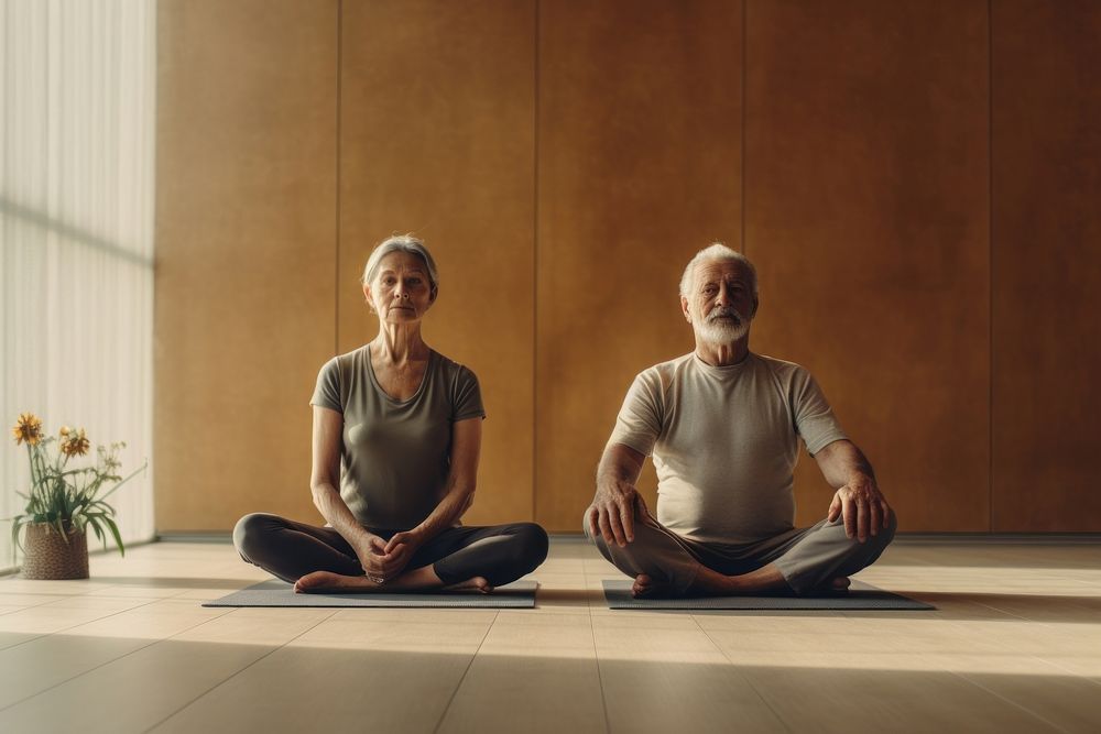 Old couple doing a yoga sports adult cross-legged. AI generated Image by rawpixel.