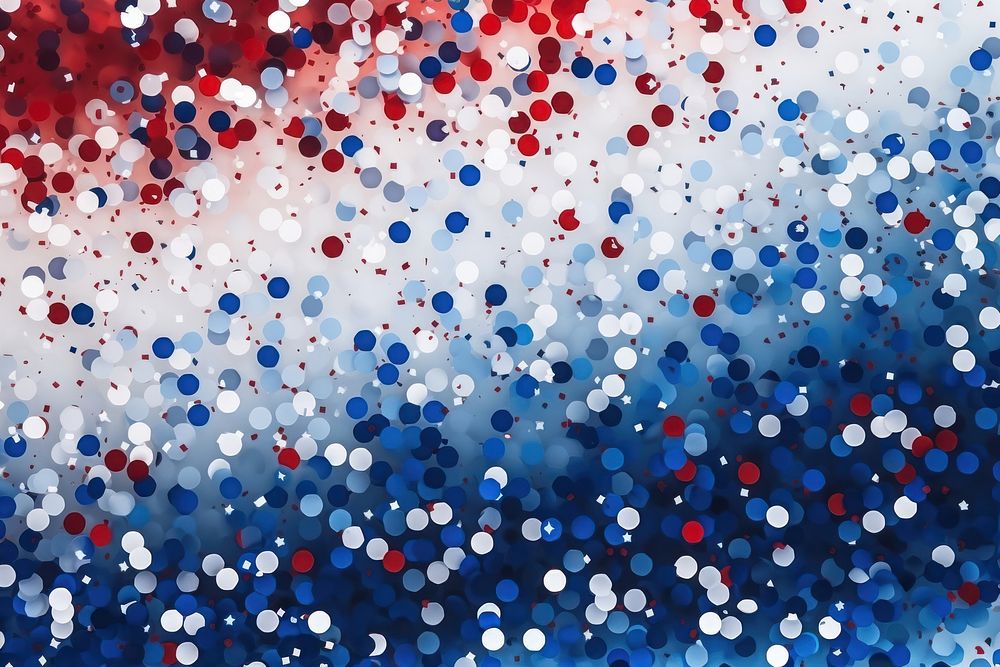 Celebration confetti in national colors of USA backgrounds splattered abstract.