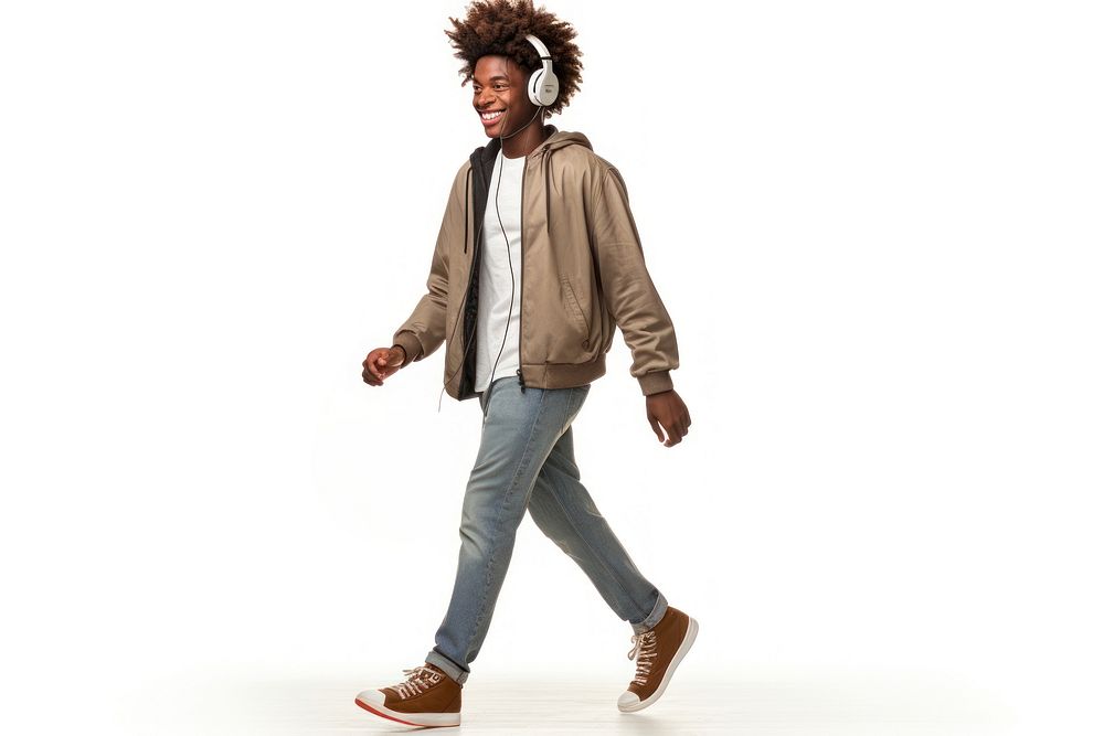 Adolescent Afro hip hop boy walking headphones adult.