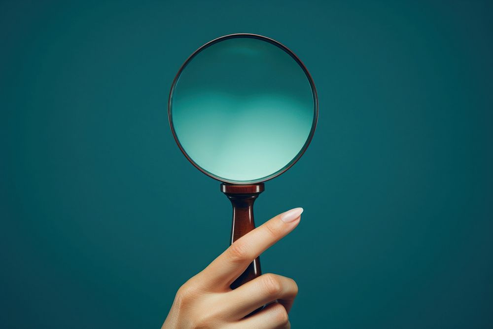 Magnifying glass holding photo hand. AI generated Image by rawpixel.