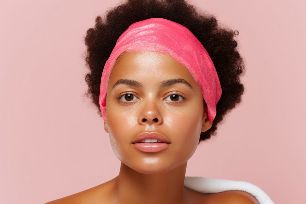 Young beautiful african american woman in skincare and beauty routine portrait photography accessories.