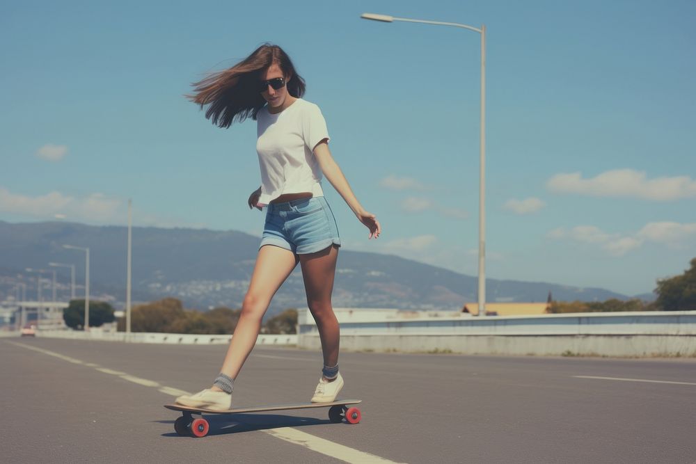 Long boarding leg woman skateboard footwear shorts.