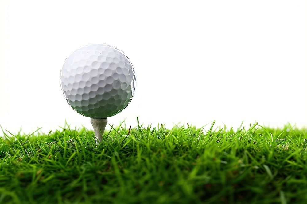 Golf ball with a golf tee on a grass sports white recreation.