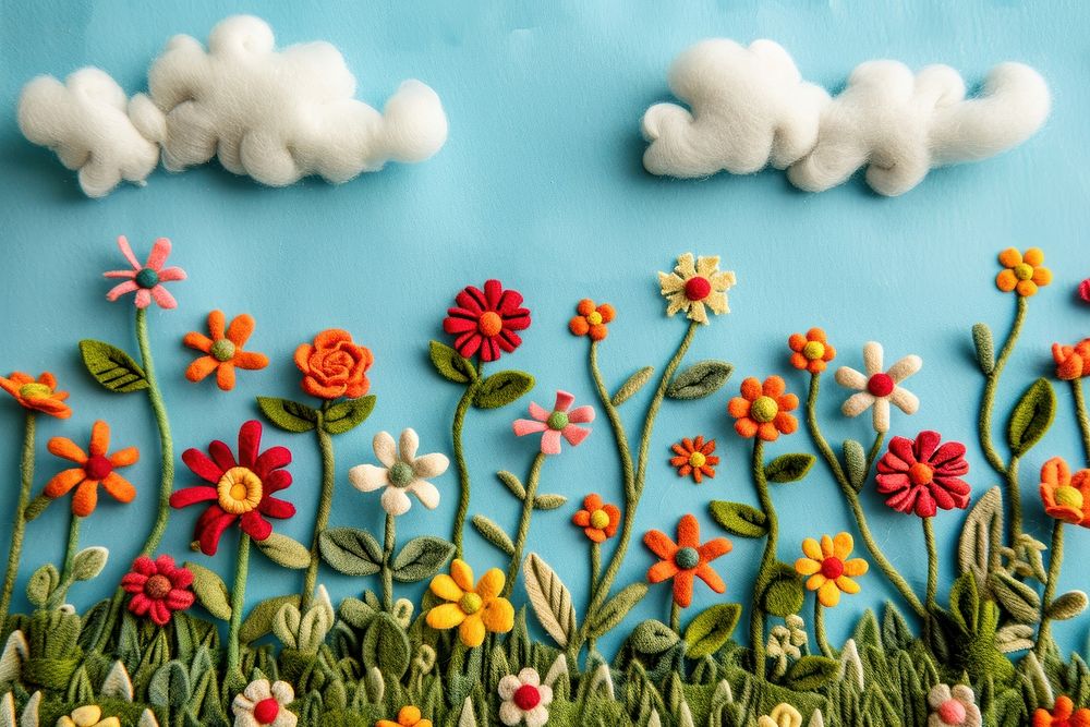 Photo of felt flower field on sky backgrounds embroidery textile.