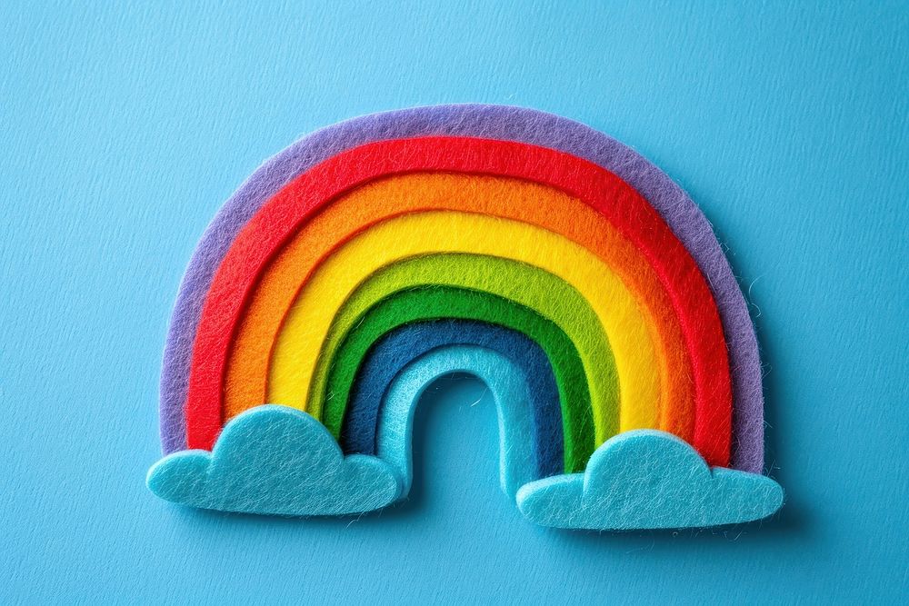 Photo of felt rainbow textile art creativity.