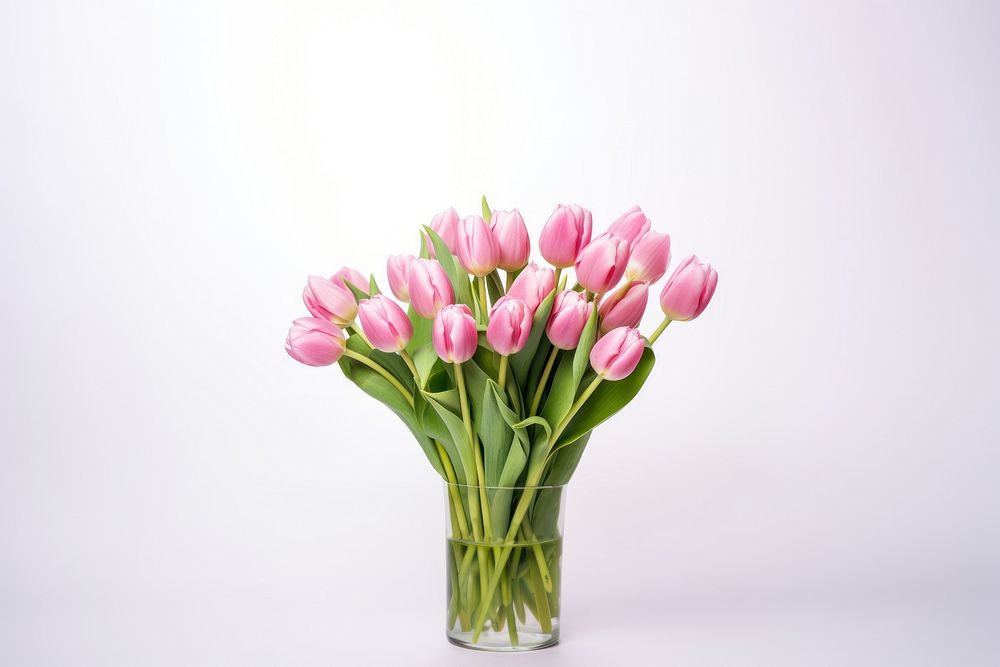 Lush bouquet of pink tulips flower plant vase. AI generated Image by rawpixel.