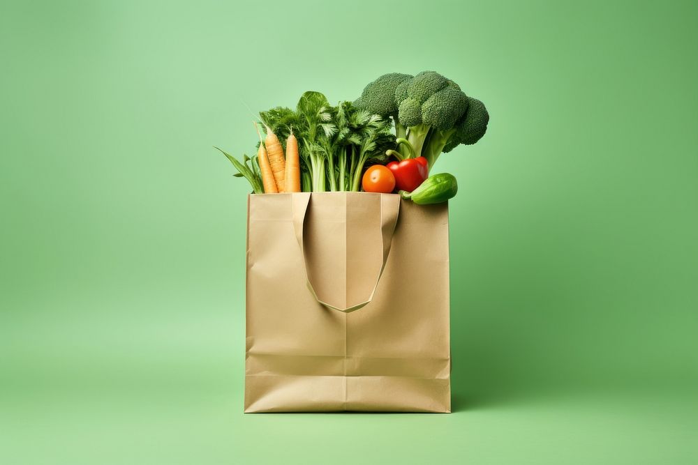 Paper bag with vegetable green food cauliflower.