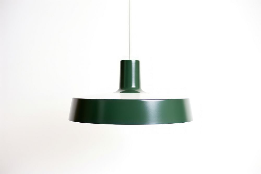 Space age green pendant lamp lampshade illuminated electricity.