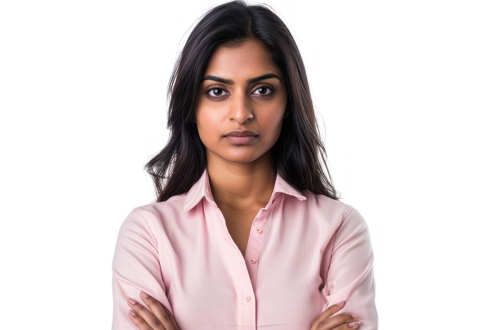 Young Indian business woman wearing a pink and skeptical expression portrait adult white background.