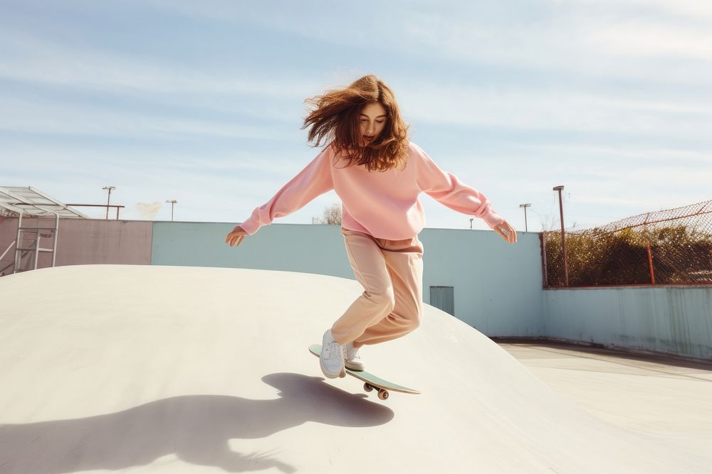 Skater girl jump and rides on skateboard at skate park adult skateboarding skateboarder.