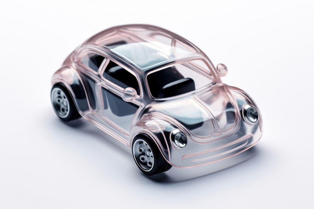Transparent glass mini car toy vehicle wheel white background.