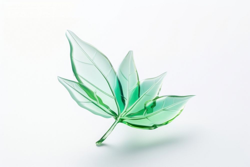 Transparent glass mini simple leaf origami plant white background.