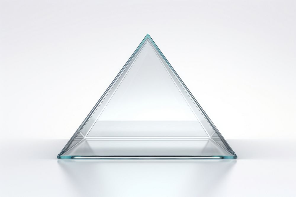 Transparent glass triangle sheet white background simplicity lighting.