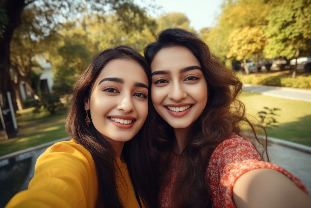 South Asian young women selfie portrait outdoors. AI generated Image by rawpixel.