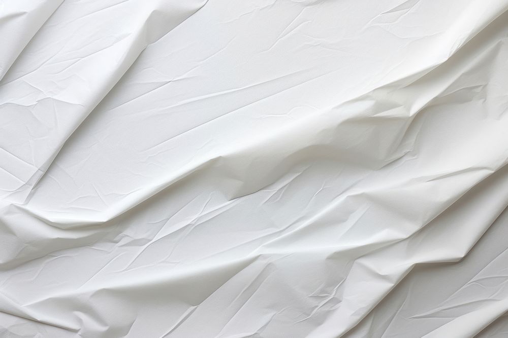 An old white paper backgrounds wrinkled crumpled. AI generated Image by rawpixel.