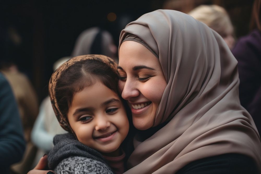 Young muslim mother hugging portrait family adult.