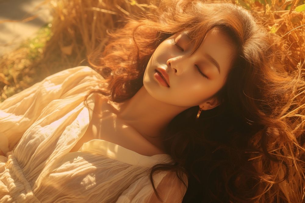 Korean girl lying on golden grass sleeping sunlight portrait. AI generated Image by rawpixel.