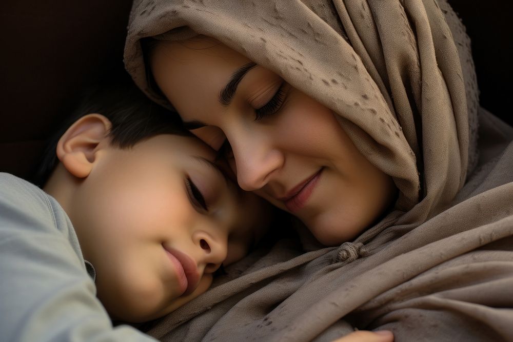Muslim mother hugging son adult affectionate togetherness.