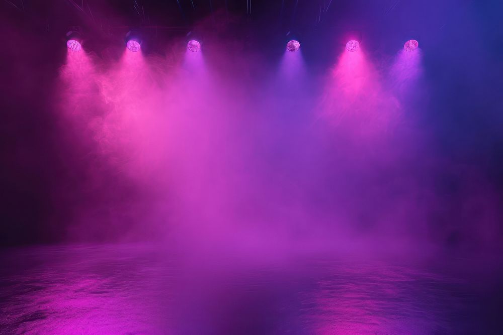 Black studio with fog violet and pink spotlights purple stage entertainment.