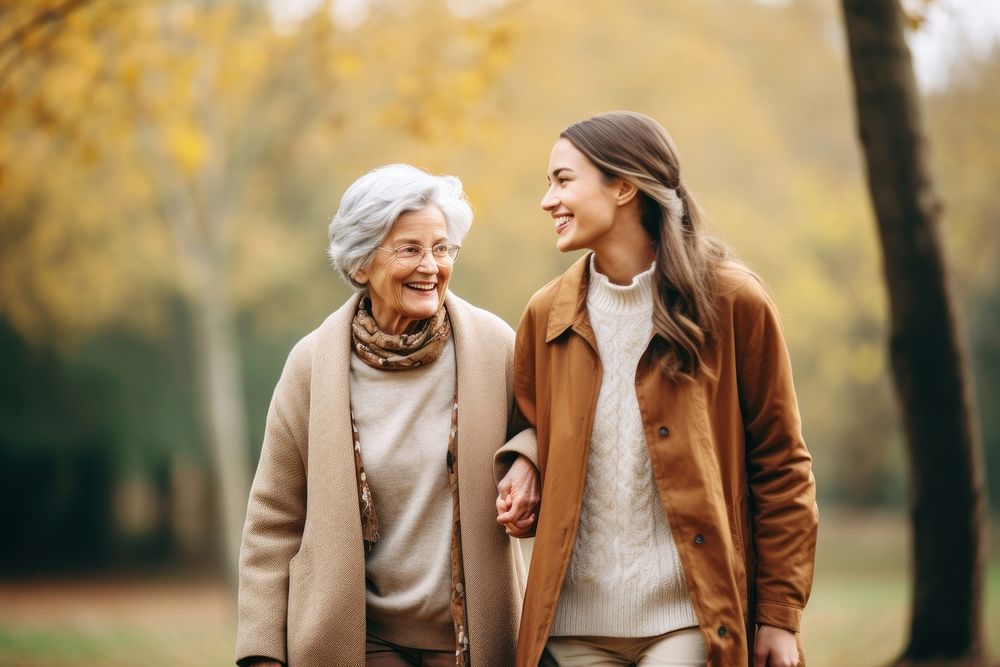 Young woman with old grandmother smiling adult love.