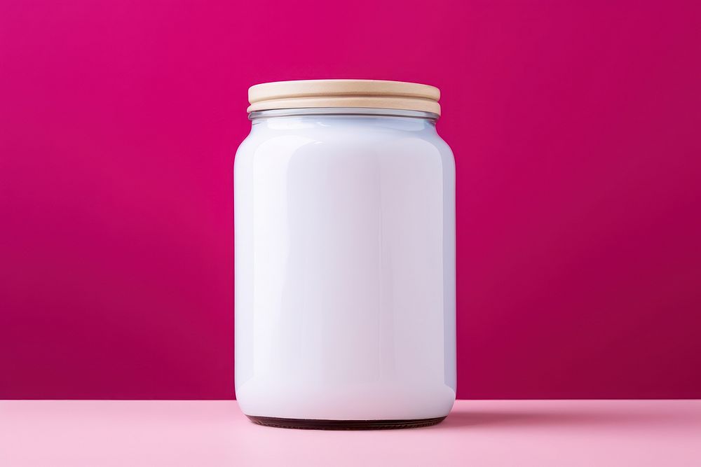 Jar  pink milk pink background.