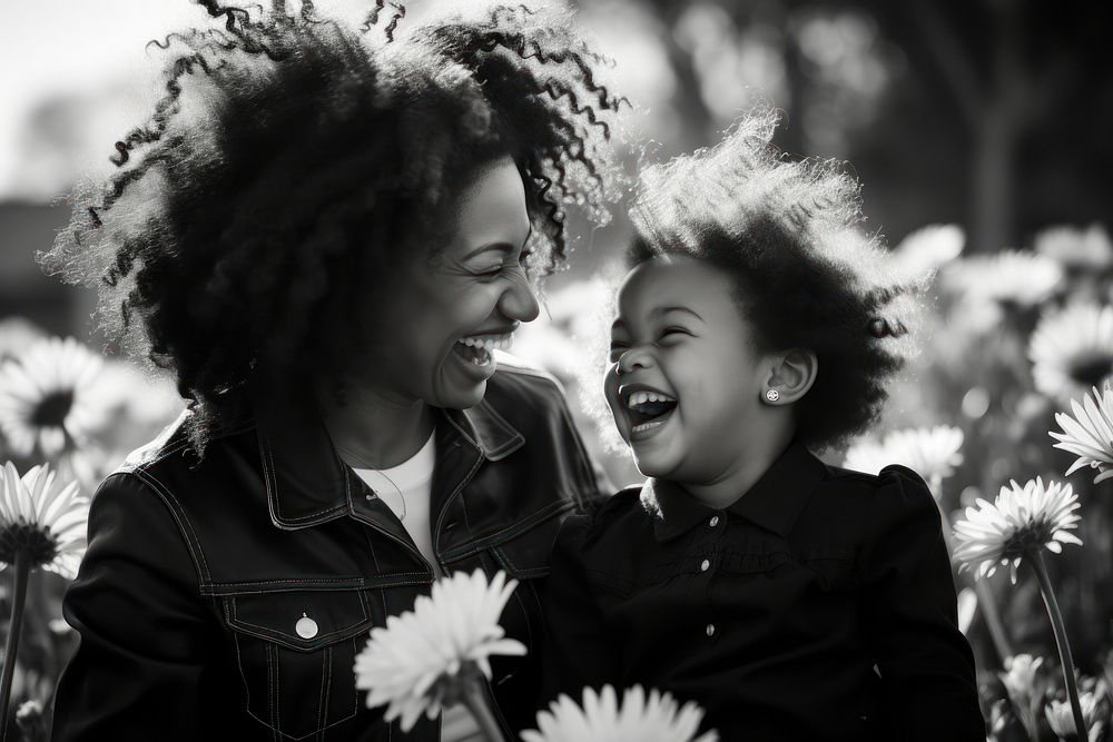 Black family laughing portrait flower.