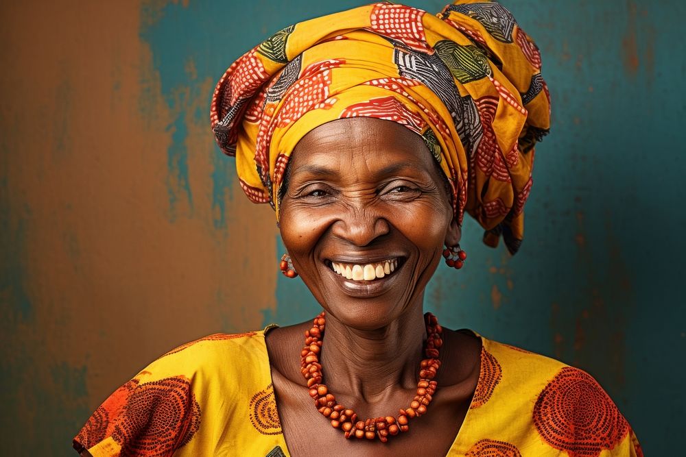 African woman necklace portrait laughing.