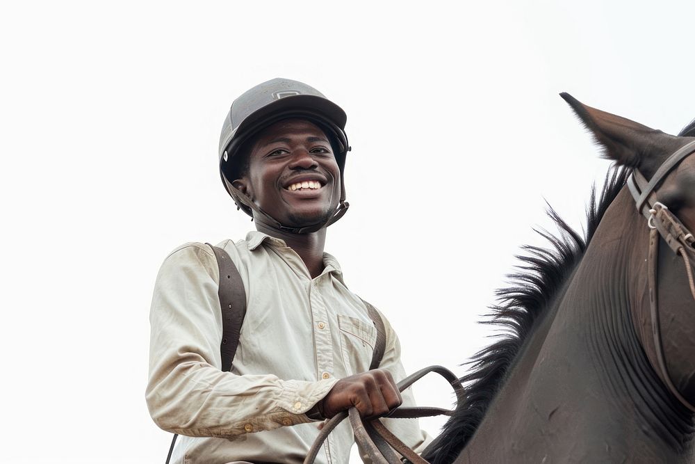 Joyful African man riding horse with safety helmet mammal animal adult.