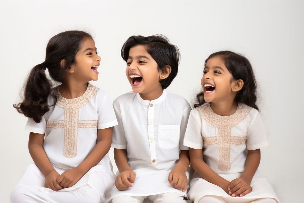 South asian child cheerful laughing. AI generated Image by rawpixel.