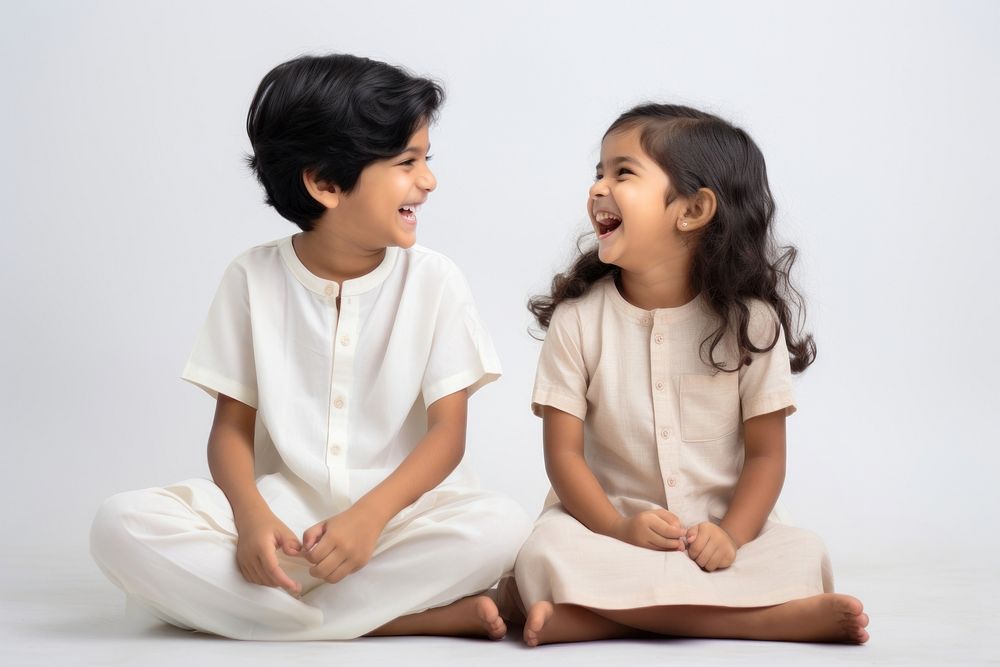 South asian child cheerful white background. AI generated Image by rawpixel.