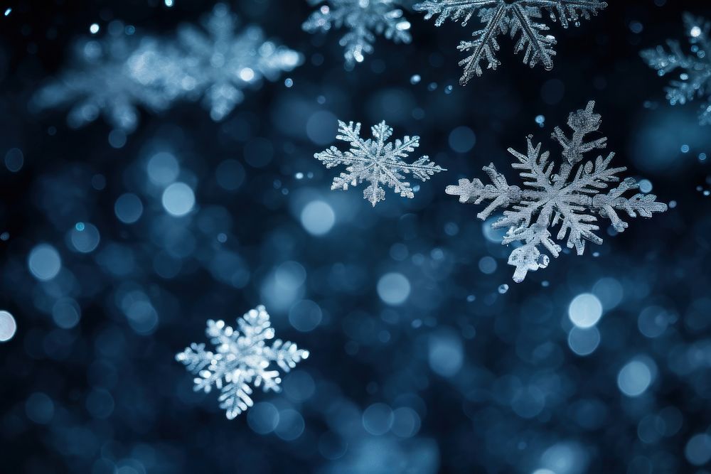 Snowflakes backgrounds nature illuminated. AI generated Image by rawpixel.