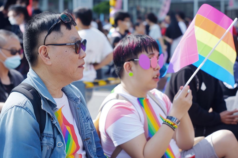 Taiwanese Middle age gay couple glasses parade adult.