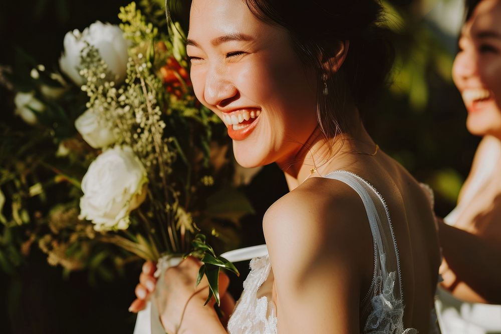 Taiwanese Stylish lesbian bride on her wedding day smile cheerful laughing.