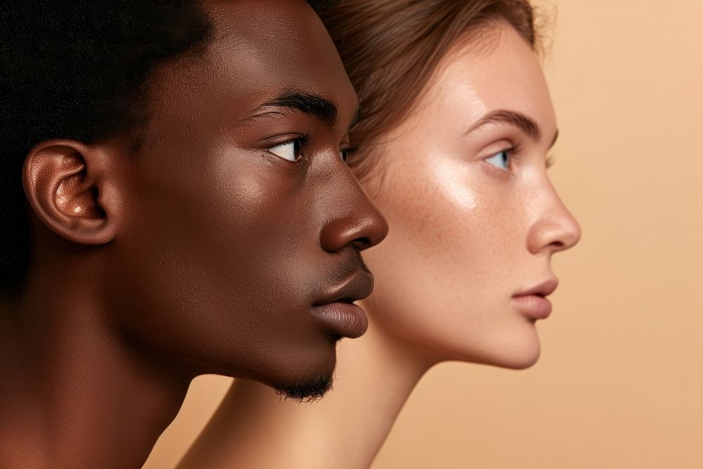 Diversity woman and man close-up facial portrait adult skin.