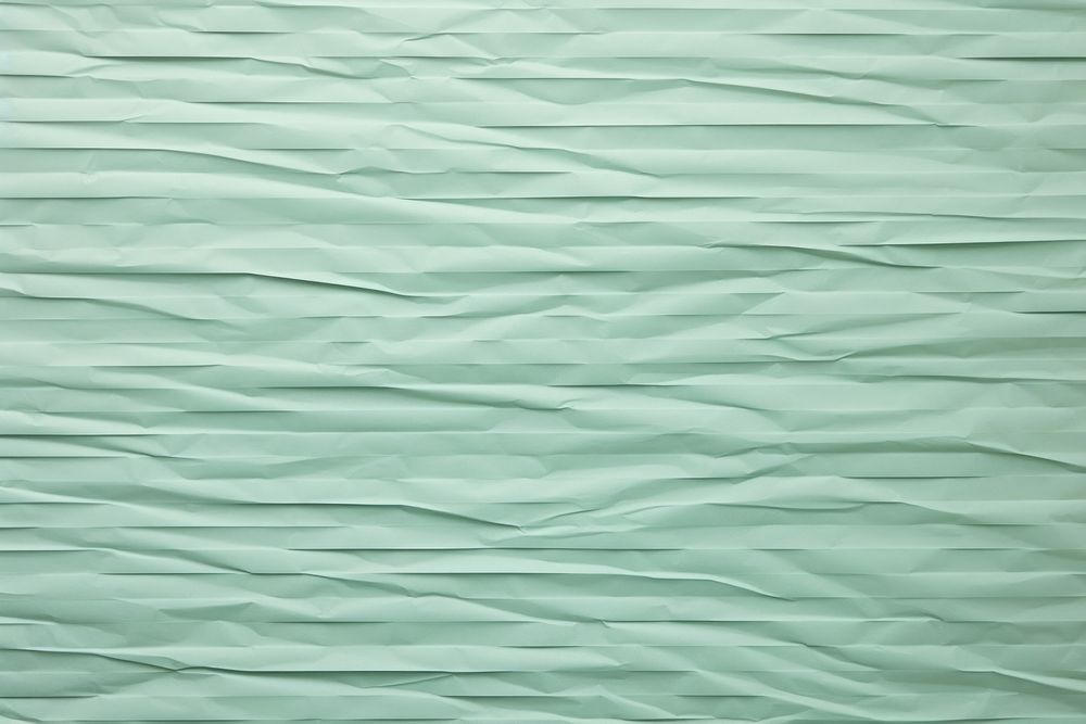 Folded mint green paper texture paper backgrounds simplicity repetition.