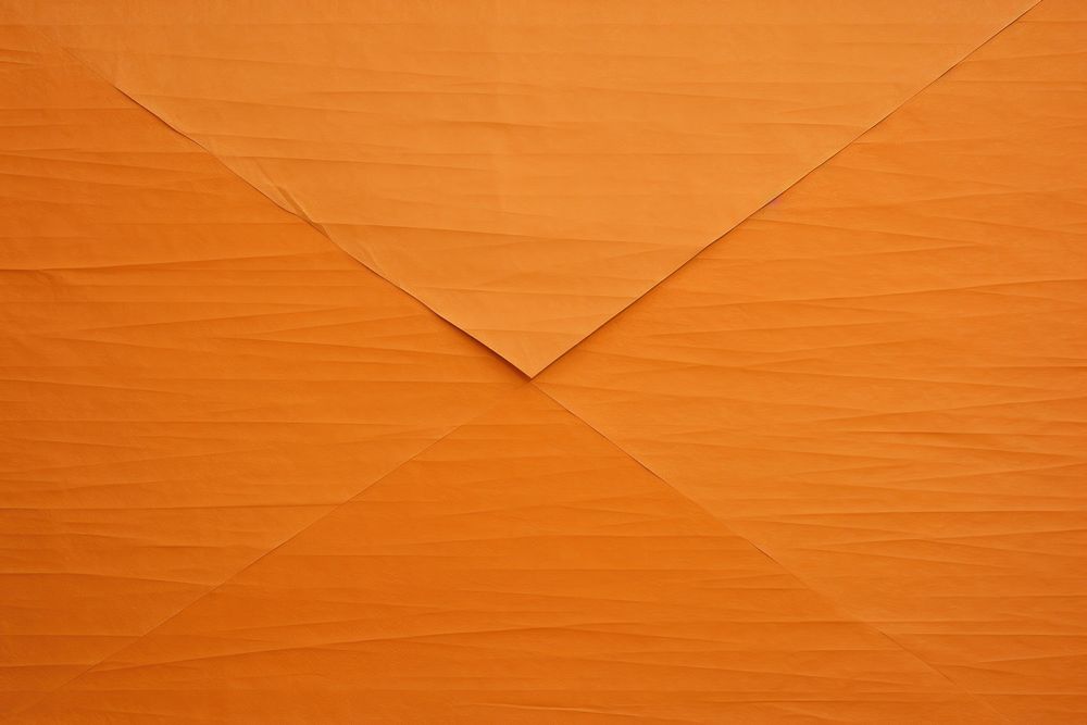 Folded orange paper texture paper backgrounds textured abstract.