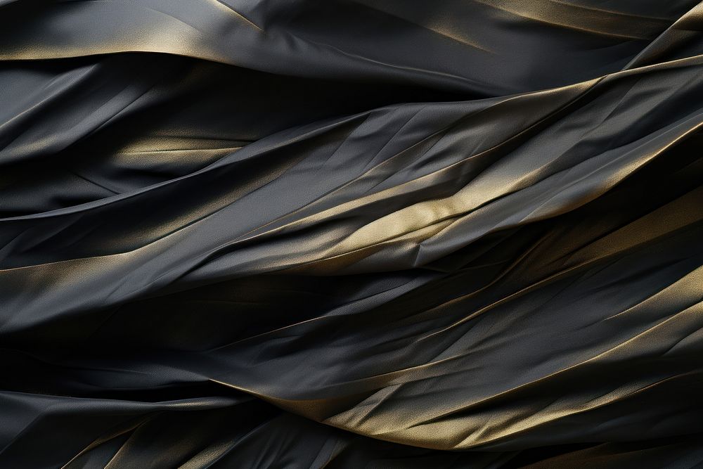 Folded black gold paper texture paper backgrounds silk monochrome.